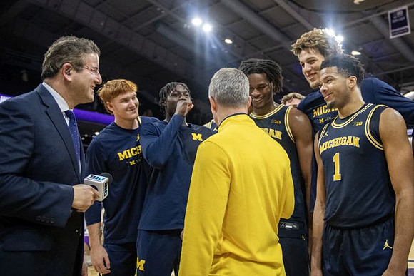 Dusty May and Michigan Team