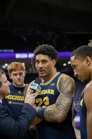 Oscar Goodman (5), Yaxel Lendeborg (23), and Nimari Burnett (4)