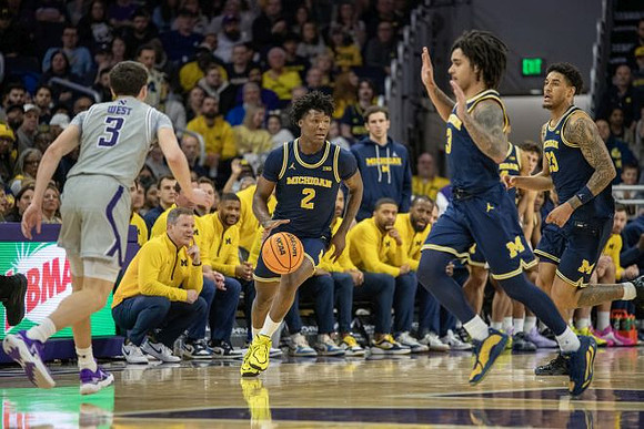 L.J. Cason (2), Elliot Cadeau (3), and Yaxel Lendeborg (23)