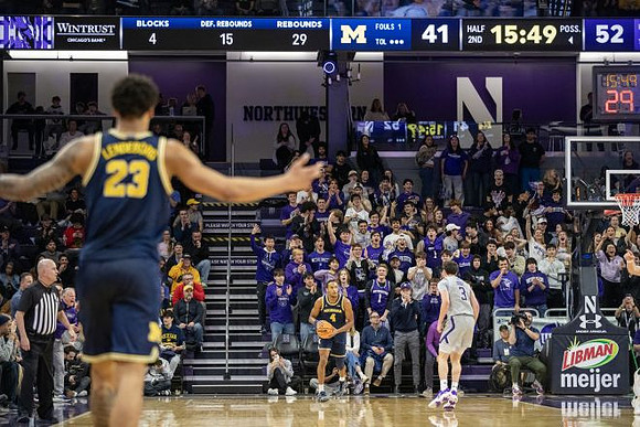 Yaxel Lendeborg (23) and Nimari Burnett (4)