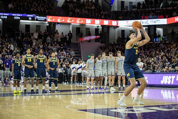 L.J. Cason (2), Yaxel Lendeborg (23), Morez Johnson Jr. (21), Trey McKenney (1), and Aday Mara (15)
