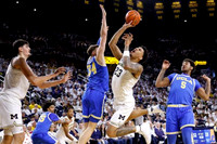 Aday Mara (15), Yaxel Lendeborg (23), and Nimari Burnett (4)