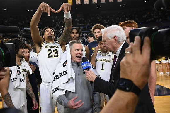 Dusty May and Michigan Team