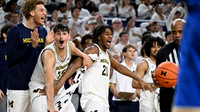 Malick Kordel (32), Aday Mara (15), Morez Johnson Jr. (21), and Elliot Cadeau (3)