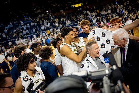 Dusty May and Michigan Team