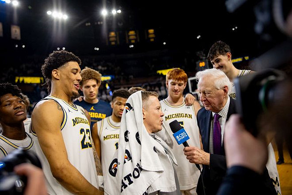Dusty May and Michigan Team