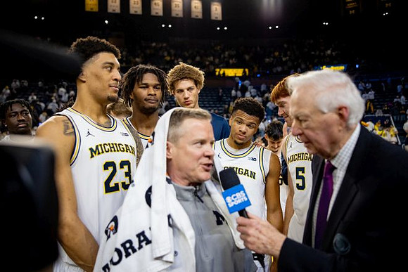 Dusty May and Michigan Team