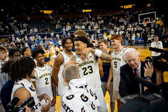 Dusty May and Michigan Team