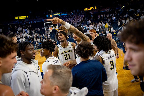 Dusty May and Michigan Team