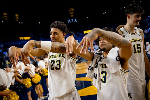Yaxel Lendeborg (23), Elliot Cadeau (3), and Aday Mara (15)