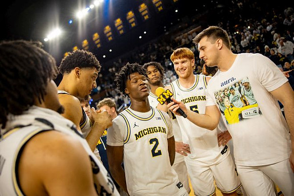 Elliot Cadeau (3), Yaxel Lendeborg (23), L.J. Cason (2), Morez Johnson Jr. (21), and Oscar Goodman (5)