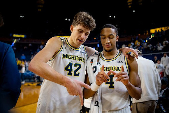 Will Tschetter (42) and Nimari Burnett (4)