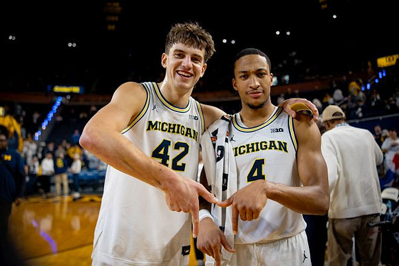 Will Tschetter (42) and Nimari Burnett (4)