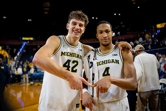 Will Tschetter (42) and Nimari Burnett (4)