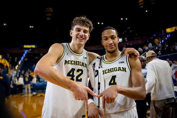 Will Tschetter (42) and Nimari Burnett (4)