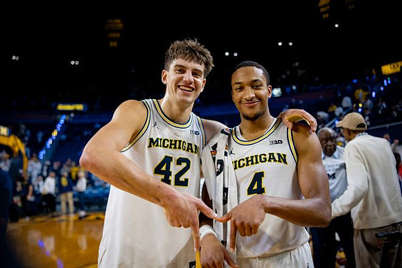 Will Tschetter (42) and Nimari Burnett (4)