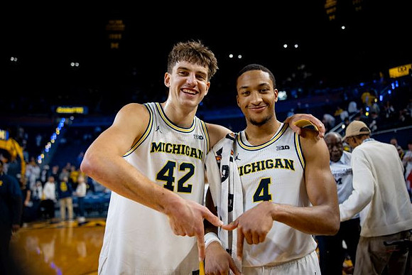 Will Tschetter (42) and Nimari Burnett (4)