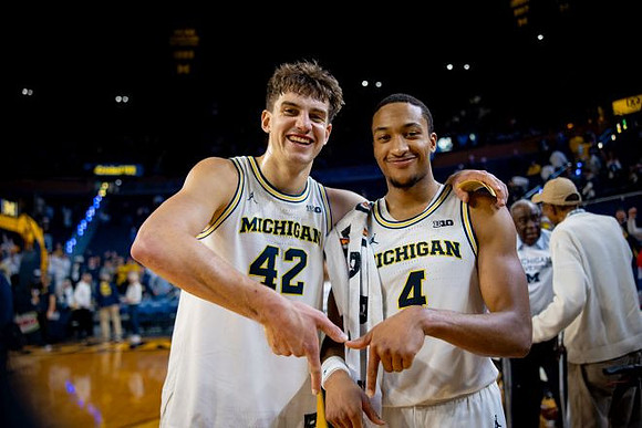 Will Tschetter (42) and Nimari Burnett (4)