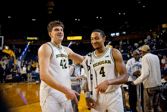 Will Tschetter (42) and Nimari Burnett (4)