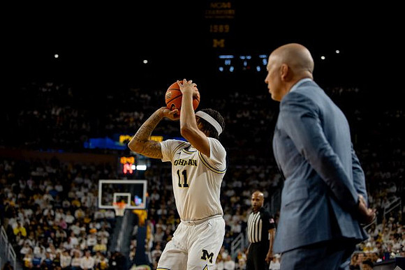 Roddy Gayle Jr. (11) and UCLA Head Coach Mick Cronin