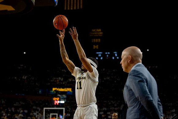 Roddy Gayle Jr. (11) and UCLA Head Coach Mick Cronin