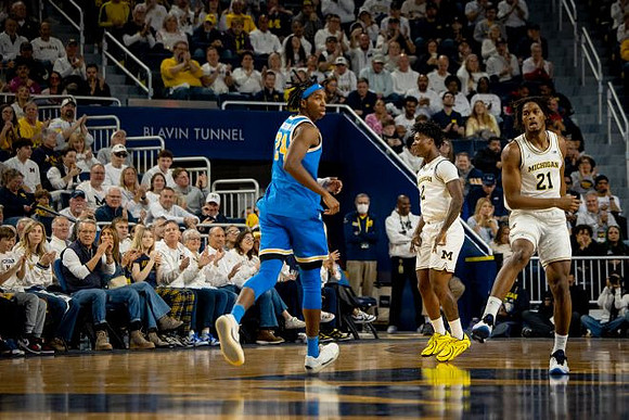 L.J. Cason (2) and Morez Johnson Jr. (21)