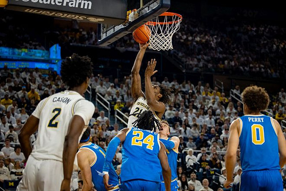 L.J. Cason (2) and Morez Johnson Jr. (21)