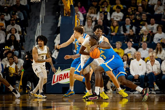 Elliot Cadeau (3) and L.J. Cason (2)
