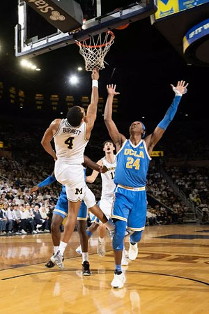Nimari Burnett (4) and Aday Mara (15)