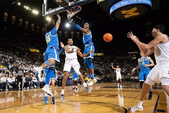 Nimari Burnett (4), Yaxel Lendeborg (23), and Aday Mara (15)