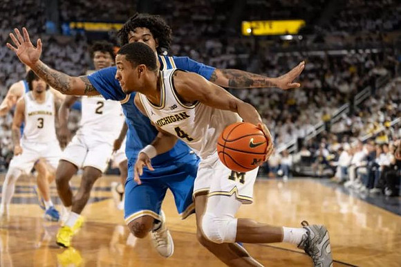 Elliot Cadeau (3), L.J. Cason (2), and Nimari Burnett (4)