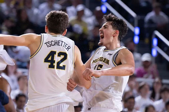 Will Tschetter (42) and Aday Mara (15)