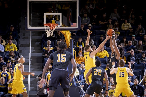 Terrance Williams II (5), Hunter Dickinson (1), and Joey Baker (15)
