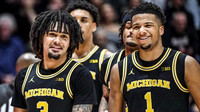 Elliot Cadeau (3), Yaxel Lendeborg (23), Roddy Gayle Jr. (11), and Trey McKenney (1)