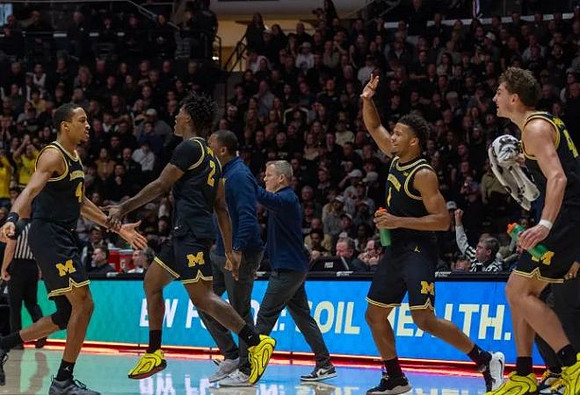 Dusty May and Michigan Team