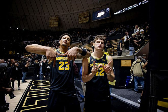 Yaxel Lendeborg (23) and Will Tschetter (42)