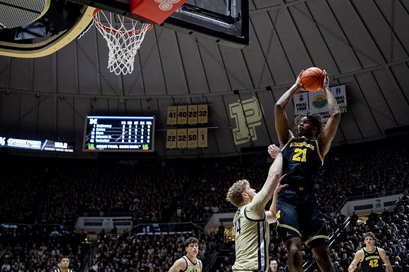 Morez Johnson Jr. (21) and Will Tschetter (42)