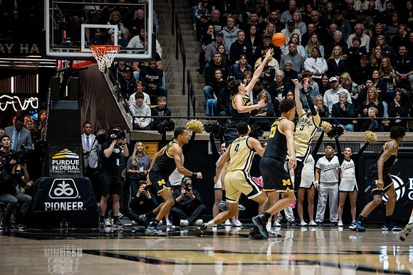Nimari Burnett (4), Aday Mara (15), Yaxel Lendeborg (23), and Morez Johnson Jr. (21)