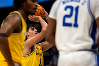 Morez Johnson Jr. (21) and Aday Mara (15)