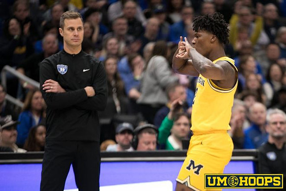Duke Head Coach Jon Scheyer and L.J. Cason (2)