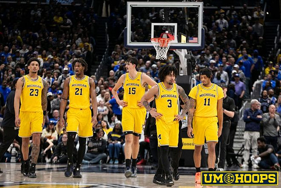 Yaxel Lendeborg (23), Morez Johnson Jr. (21), Aday Mara (15), Elliot Cadeau (3), and Roddy Gayle Jr. (11)