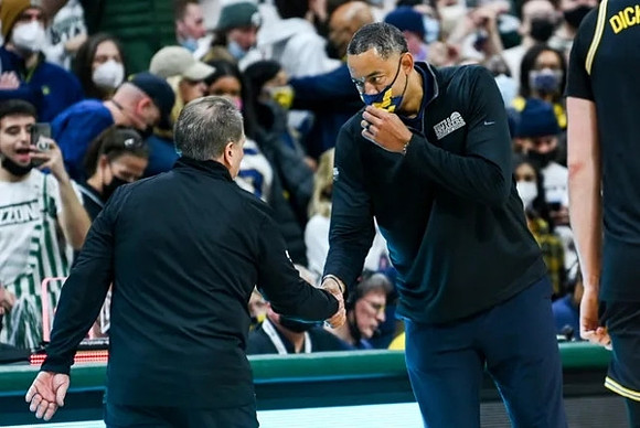 Michigan State Head Coach Tom Izzo and Juwan Howard