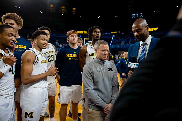 Dusty May and Michigan Team