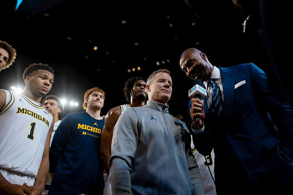 Dusty May and Michigan Team