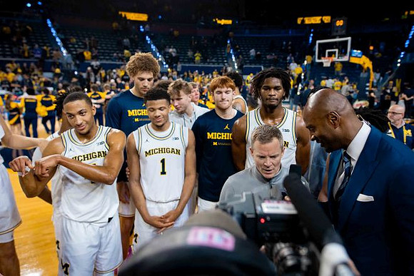 Dusty May and Michigan Team