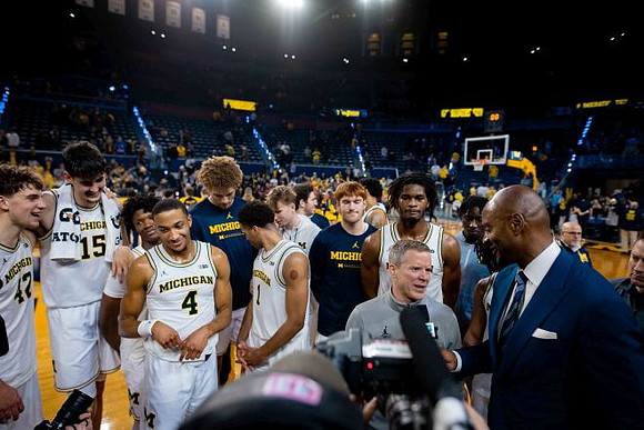 Dusty May and Michigan Team