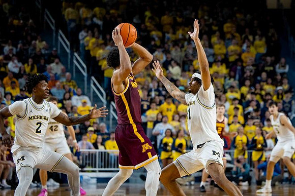 L.J. Cason (2), Will Tschetter (42), Roddy Gayle Jr. (11), and Aday Mara (15)