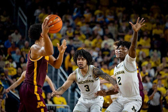 Elliot Cadeau (3) and L.J. Cason (2)