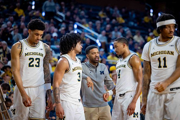 Yaxel Lendeborg (23), Elliot Cadeau (3), Nimari Burnett (4), and Roddy Gayle Jr. (11)