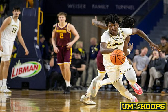 Aday Mara (15) and L.J. Cason (2)